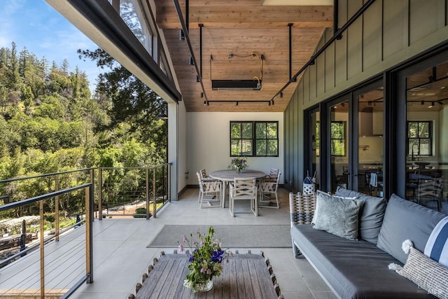 exterior space with sink and outdoor lounge area