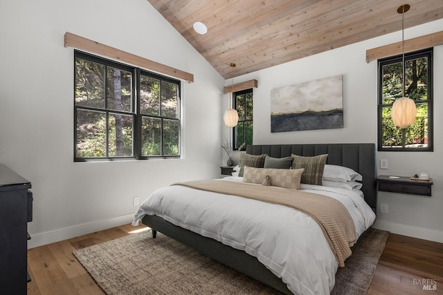 bedroom with wooden ceiling, wood-type flooring, and vaulted ceiling