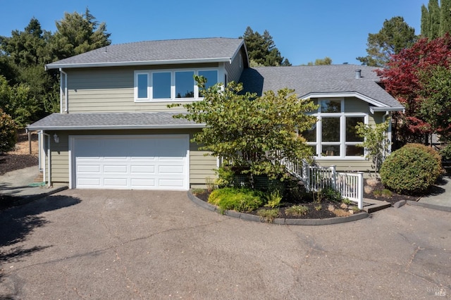 view of front of home featuring a garage