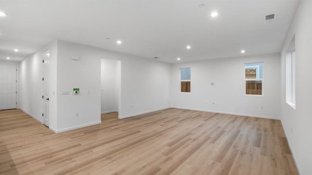 empty room with light wood-type flooring