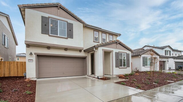 view of front of property with a garage