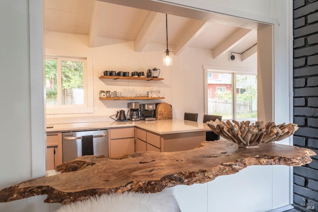 kitchen with dishwasher, a healthy amount of sunlight, beam ceiling, and kitchen peninsula