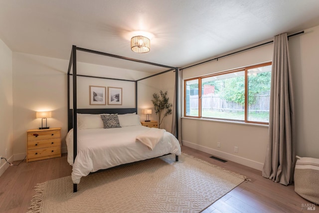 bedroom featuring light hardwood / wood-style floors