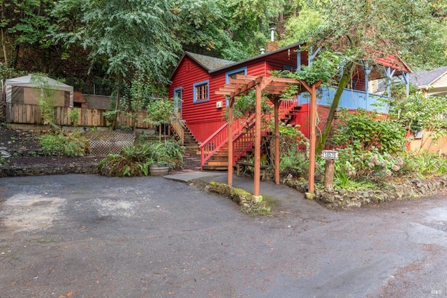 exterior space featuring a pergola