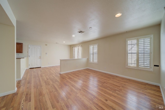 empty room featuring light hardwood / wood-style floors