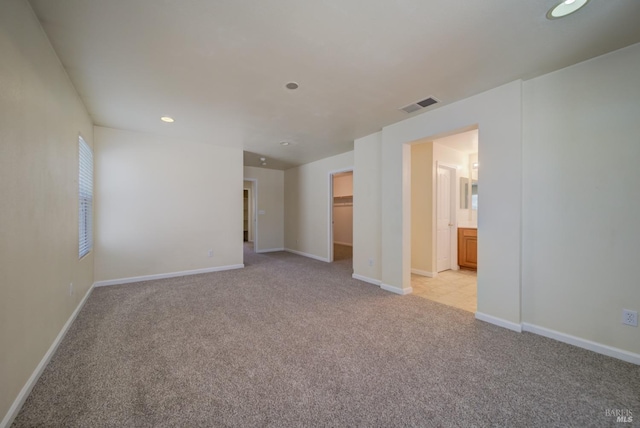 view of carpeted spare room