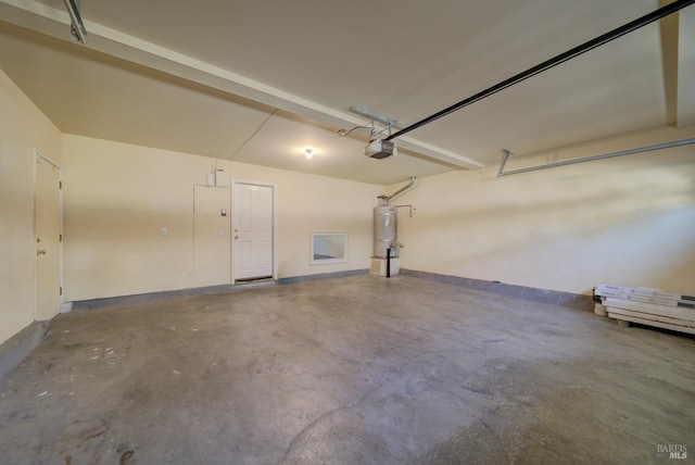 garage featuring secured water heater and a garage door opener