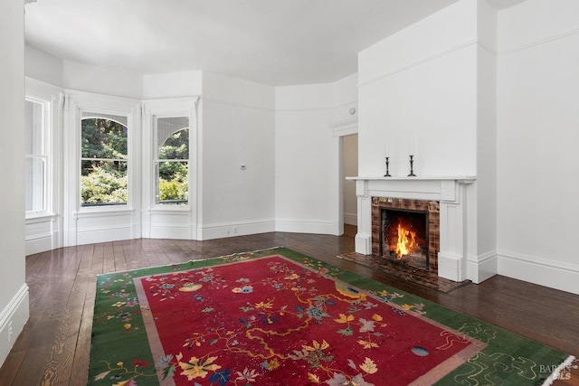 living room with dark hardwood / wood-style flooring