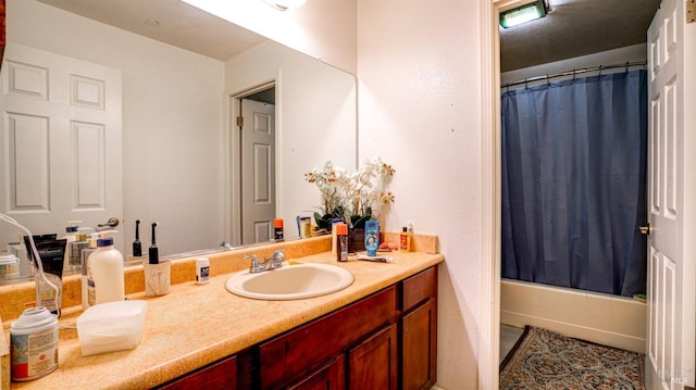 full bathroom with shower / bathtub combination with curtain and vanity