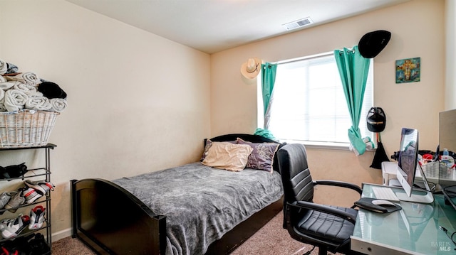 bedroom with carpet and visible vents