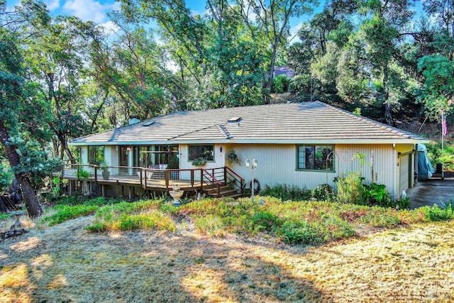 view of front of property with a deck