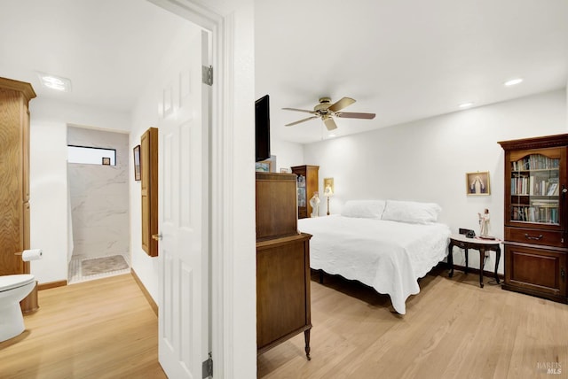 bedroom with ceiling fan and light wood-type flooring