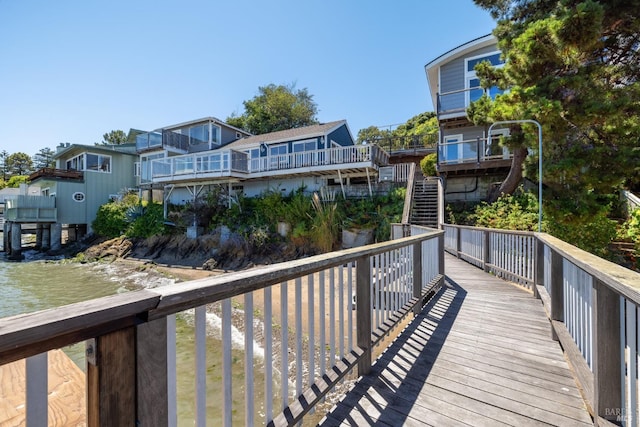 balcony featuring a water view