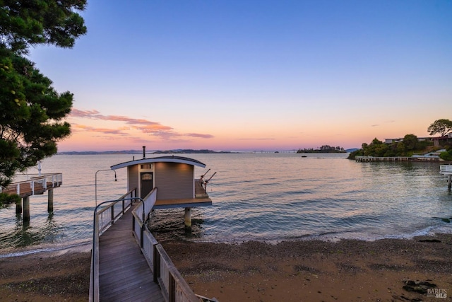 dock area featuring a water view