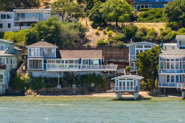 birds eye view of property featuring a water view