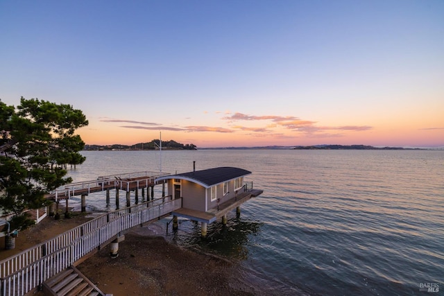 dock area featuring a water view