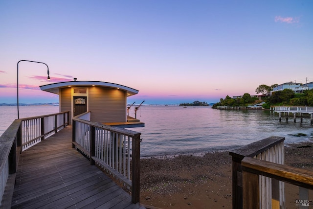 dock area featuring a water view