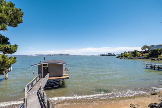 dock area with a water view