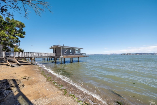 view of dock with a water view