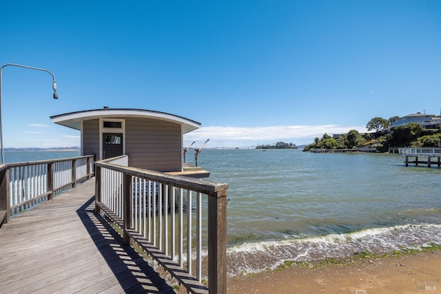 view of dock with a water view