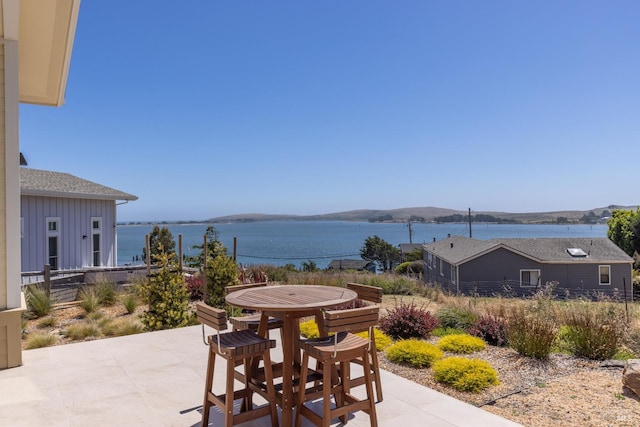 view of patio / terrace featuring a water view