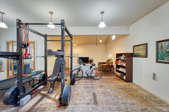 exercise area with hardwood / wood-style floors