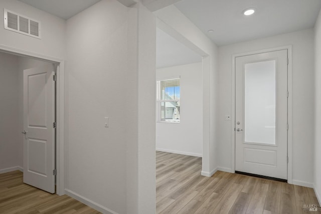 entrance foyer featuring light hardwood / wood-style floors