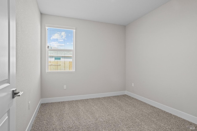 empty room featuring carpet floors