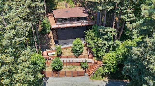 bird's eye view featuring a forest view