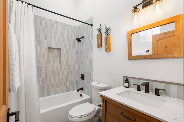 full bathroom featuring vanity, toilet, and shower / bath combo with shower curtain