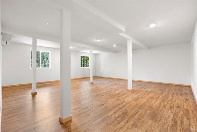 basement featuring light wood-type flooring