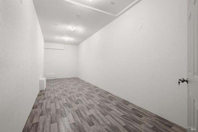 unfurnished room featuring hardwood / wood-style floors