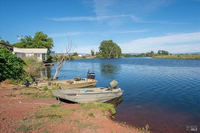 view of dock with a water view