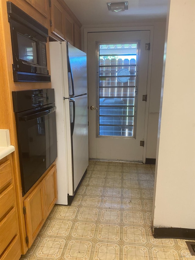 kitchen with black appliances