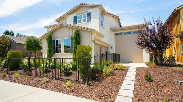 view of front of property with a garage