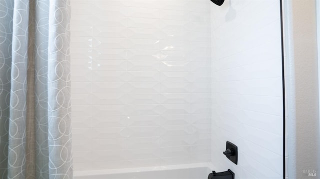 bathroom featuring shower / tub combo with curtain