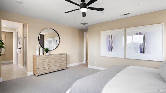 tiled bedroom with ceiling fan