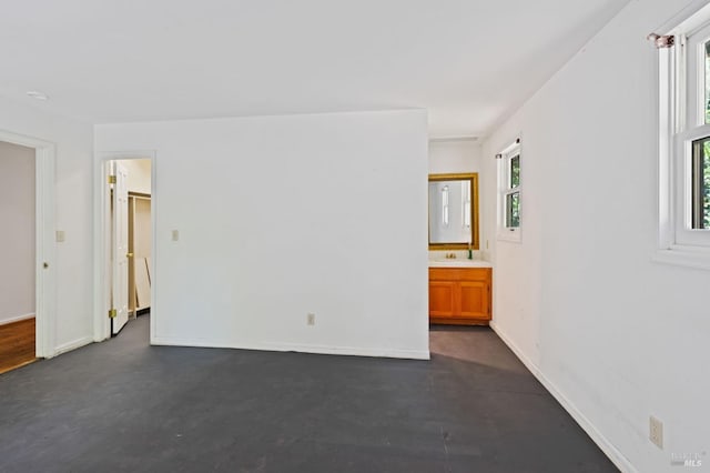 interior space featuring sink and a wealth of natural light