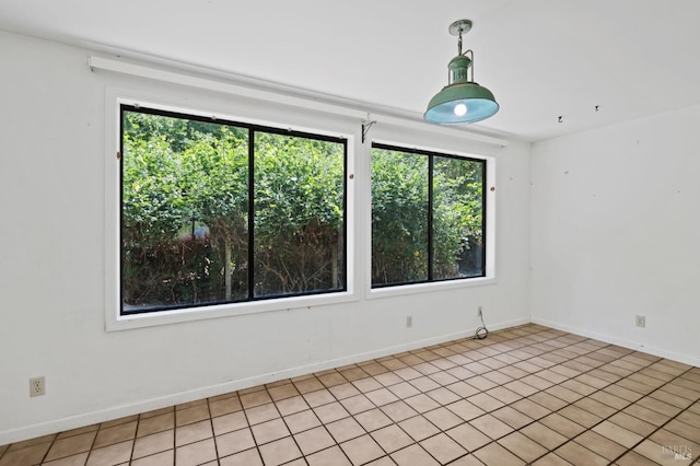 empty room featuring light tile patterned flooring