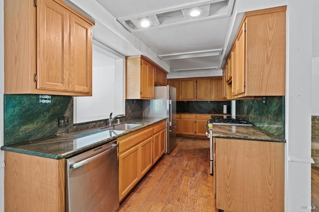 18751 Appian Way, Navarro, CA 95463 - kitchen with stainless steel appliances, wood finished floors, tasteful backsplash, and dark stone countertops