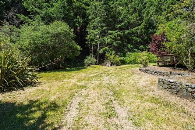 18751 Appian Way, Navarro, CA 95463 - view of green lawn featuring a deck and a view of trees