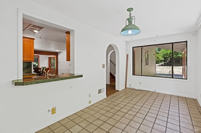 18751 Appian Way, Navarro, CA 95463 - empty room featuring arched walkways and light tile patterned floors