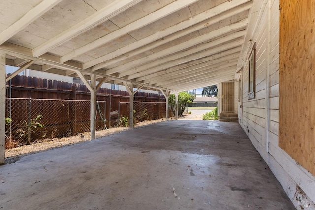 view of patio featuring fence