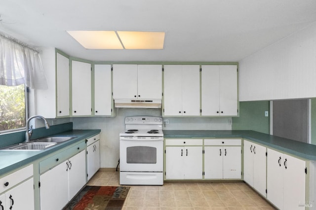 kitchen with under cabinet range hood, white cabinets, a sink, and white electric stove