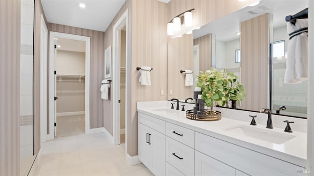 bathroom featuring vanity and an enclosed shower