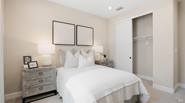 carpeted bedroom featuring a closet