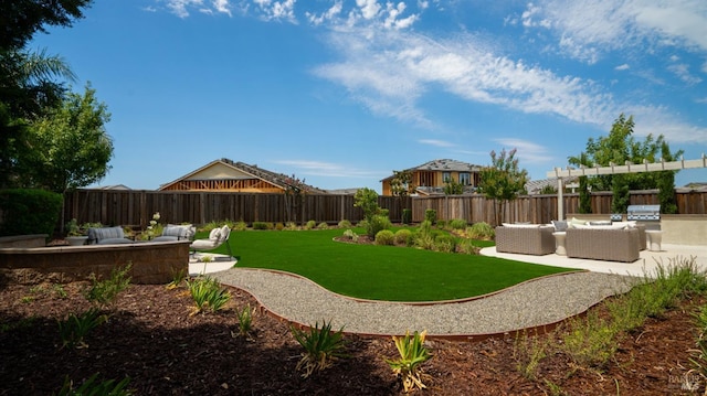 view of yard featuring a patio, an outdoor living space, and area for grilling