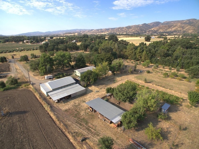 bird's eye view featuring a mountain view and a rural view