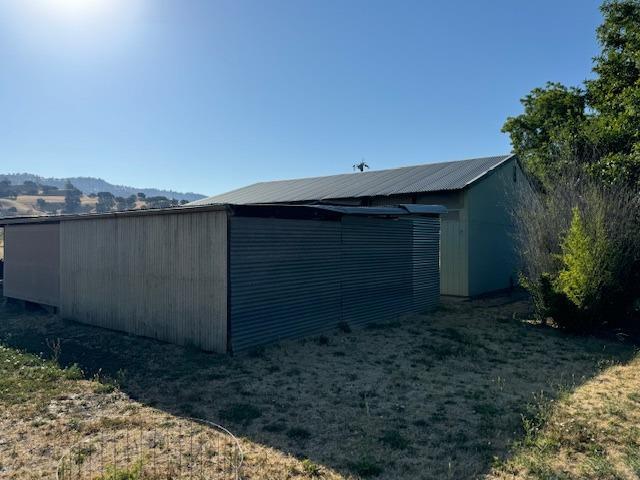 view of outdoor structure featuring a mountain view