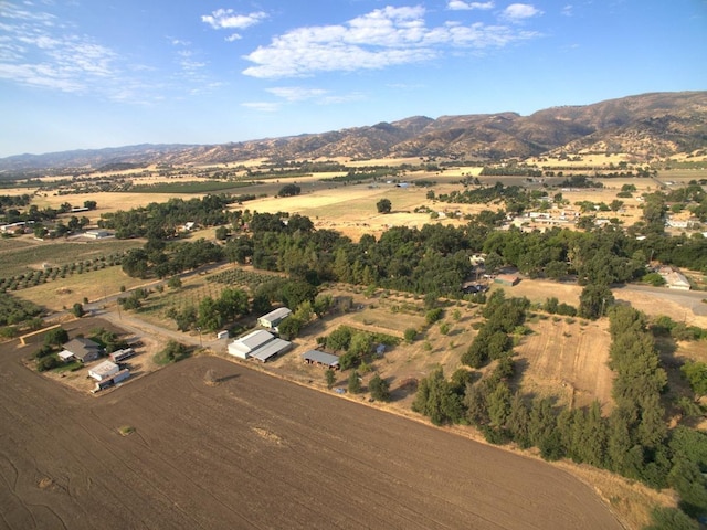 aerial view featuring a mountain view and a rural view